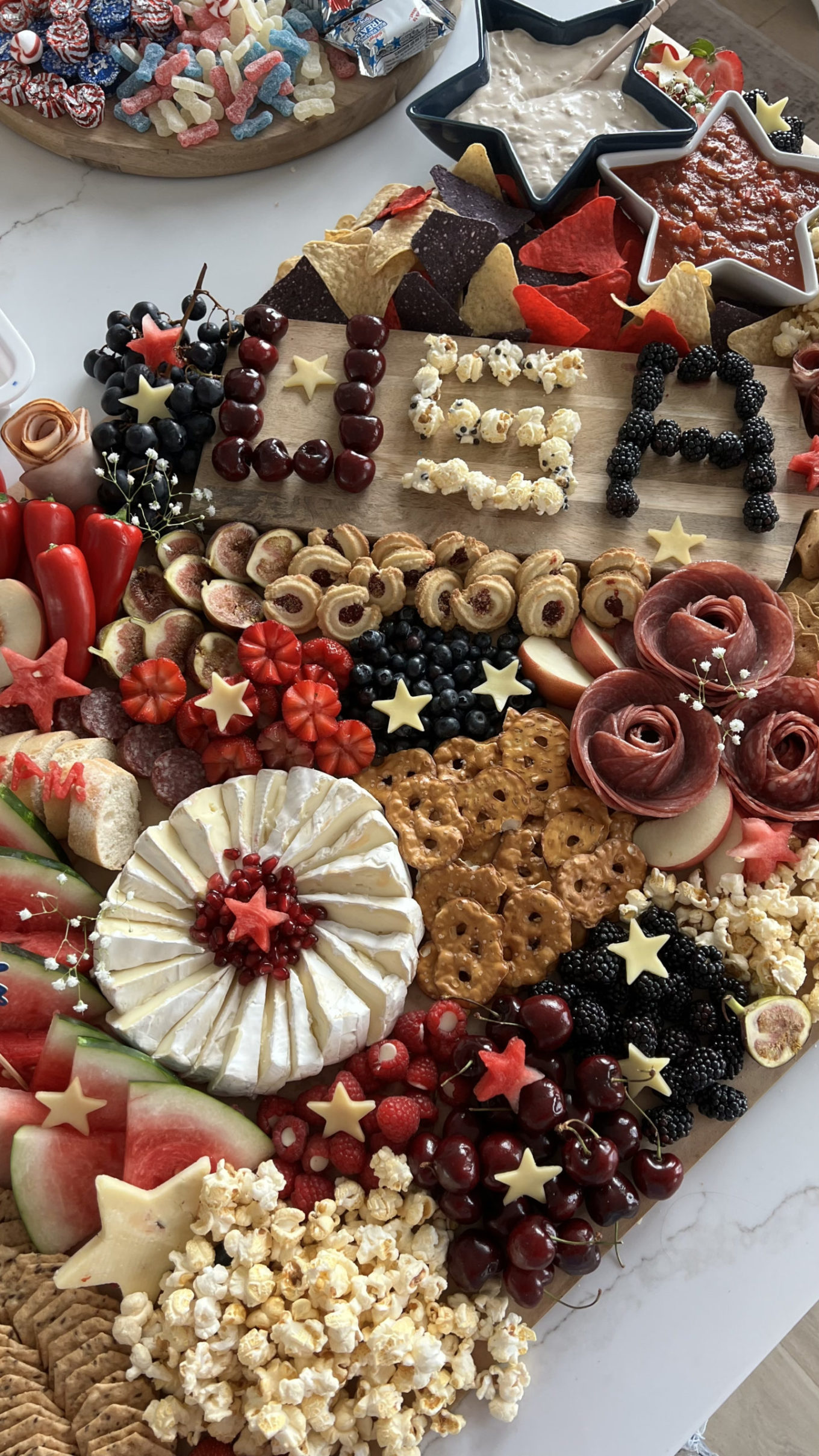 Fourth of July, 5 party hacks, 4th of July party, festive fruit, verisimilitude coordinated fruit, charcuterie spread, party spread, charcuterie board, Sams club, 4th of July, 4th of July charcuterie board