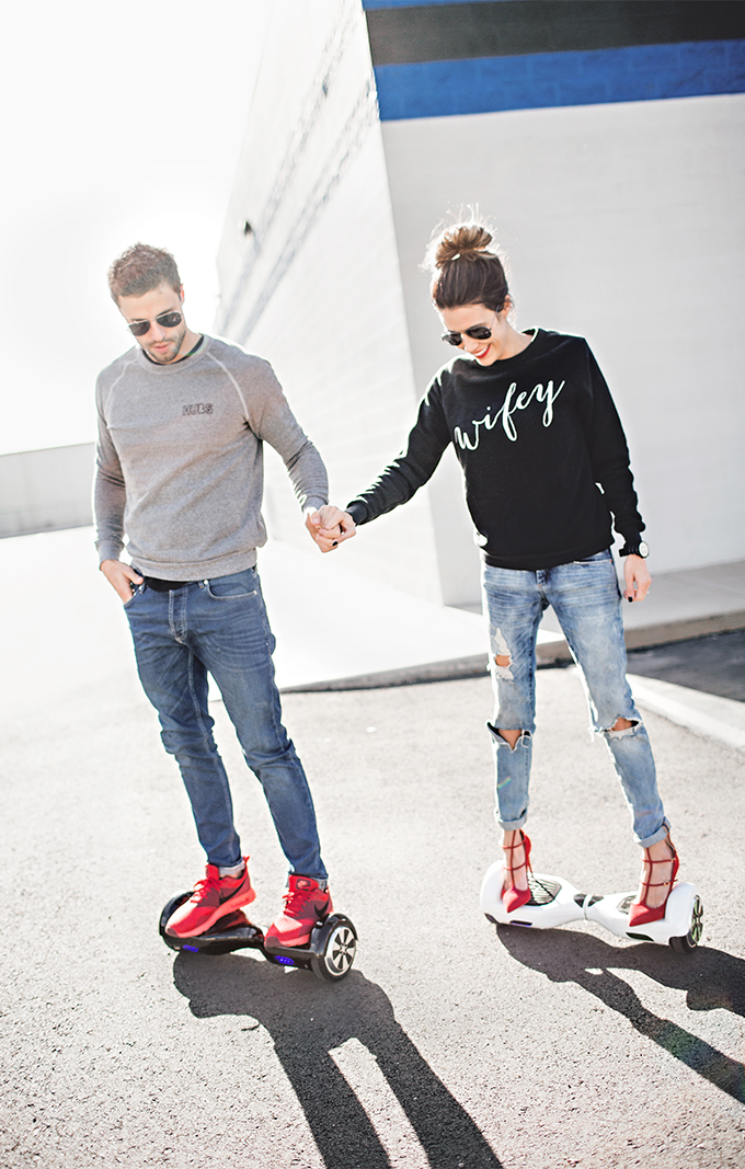 Husband and wife on hover boards