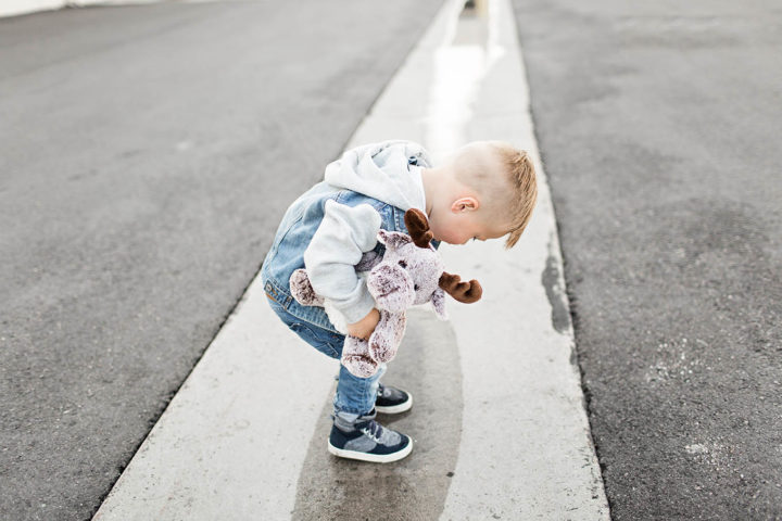Toddler and stuffed animal