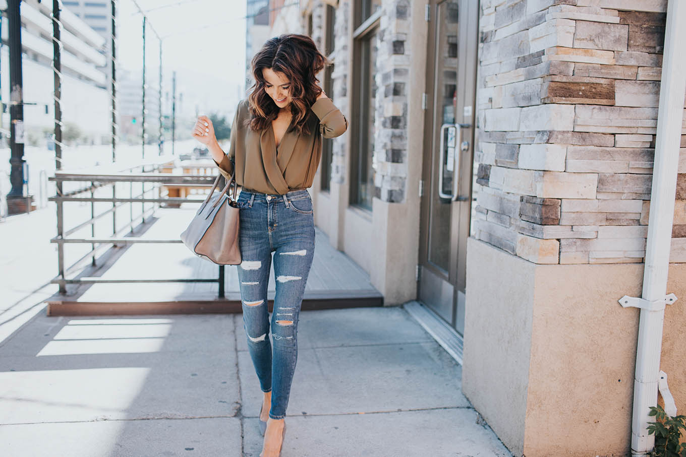 high-waisted distressed denim