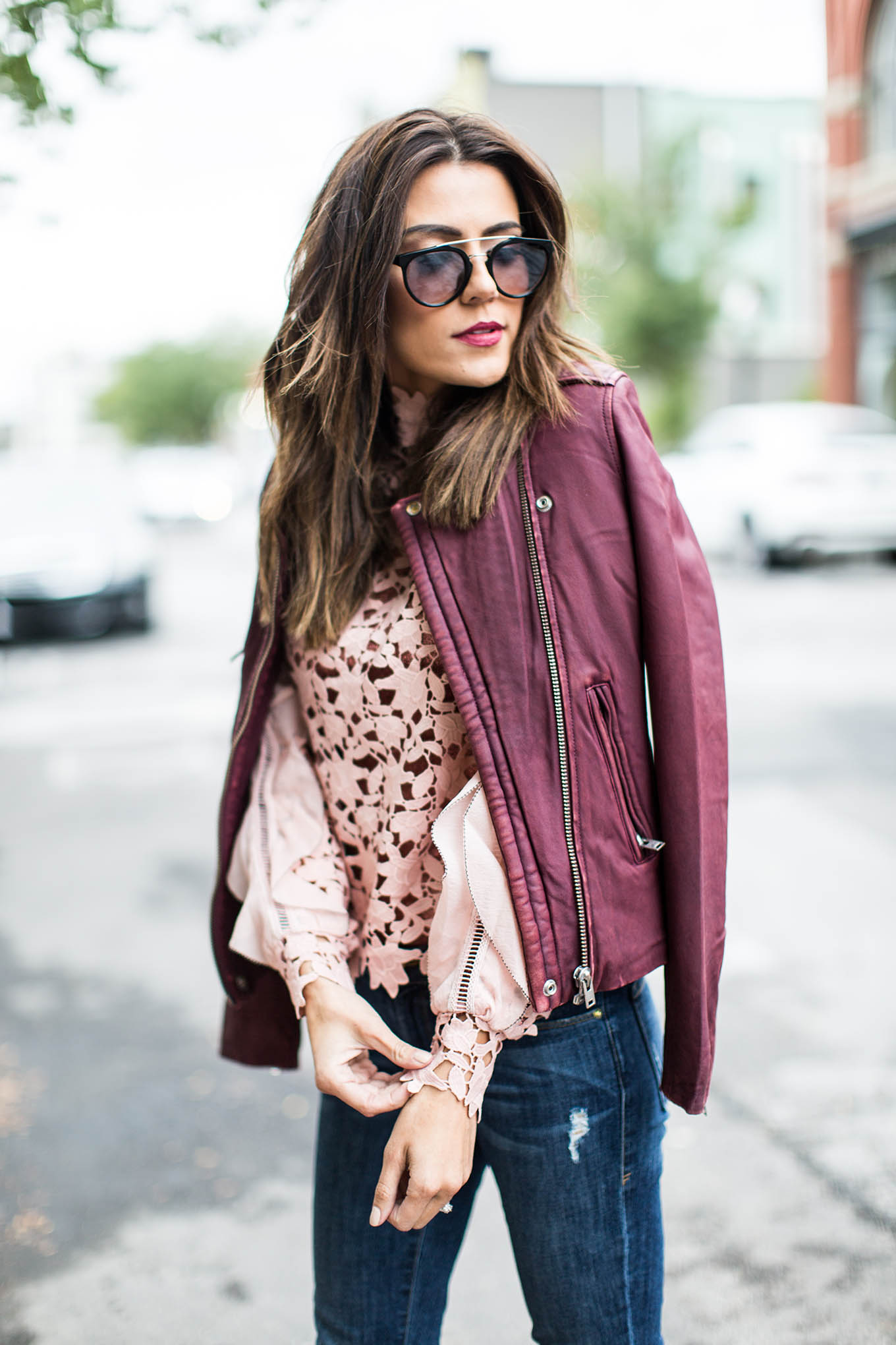 leather jacket and lace top