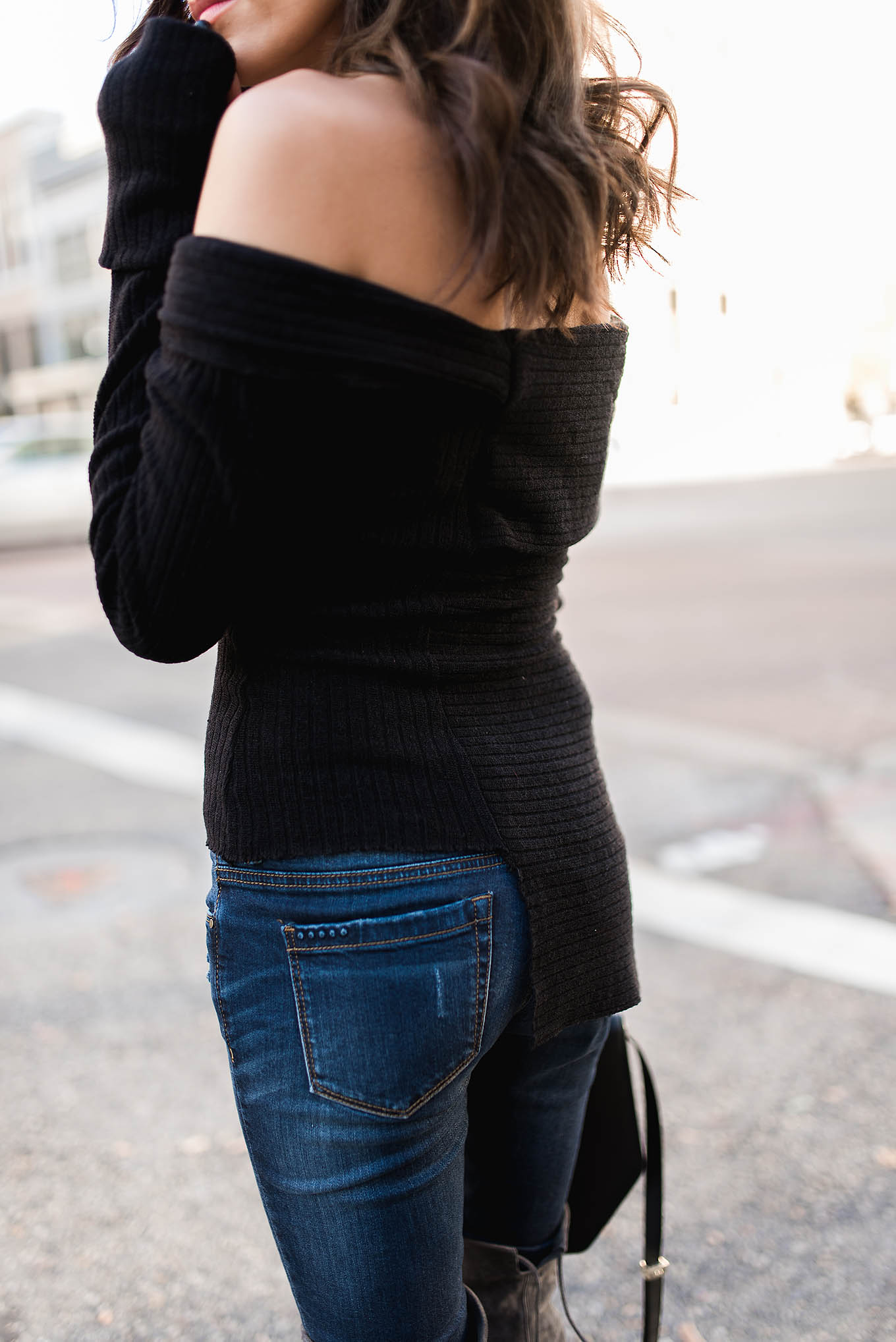 black off-the-shoulder sweater