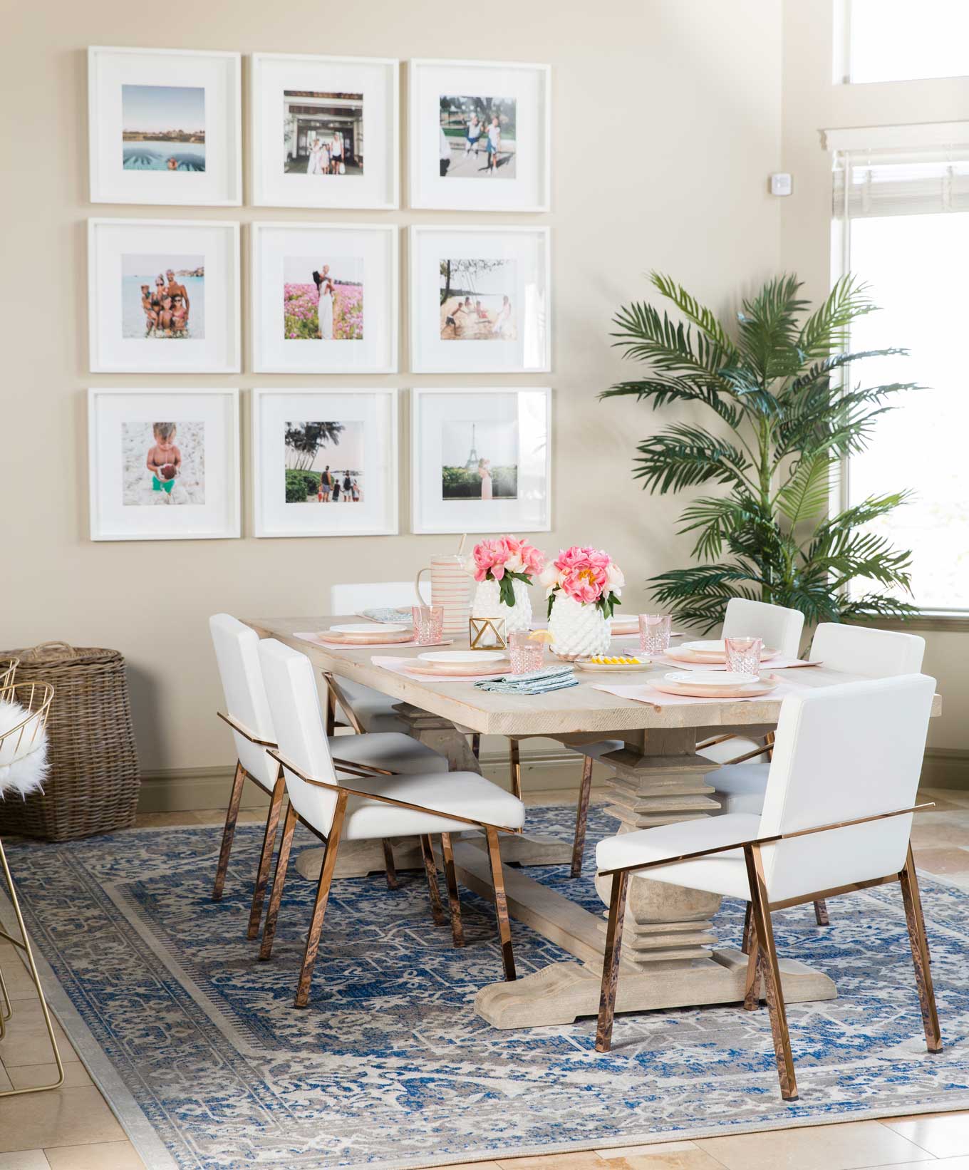 This rug placement leaves enough room for the chairs around the table to move! It's a perfect size for the dining room table and mimics the size and shape of the table, pulling the whole room together. 