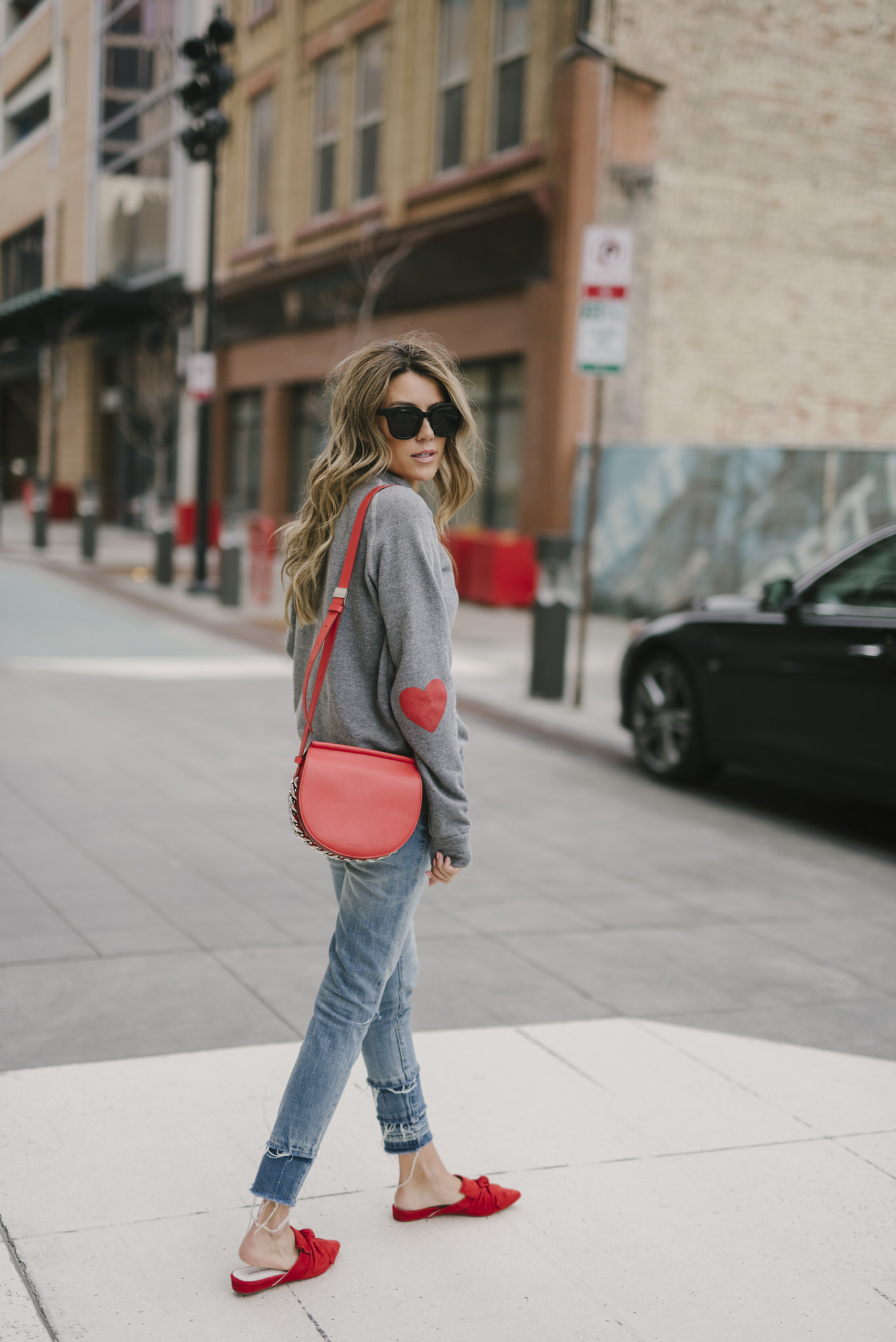 heart on sleeve sweatshirt