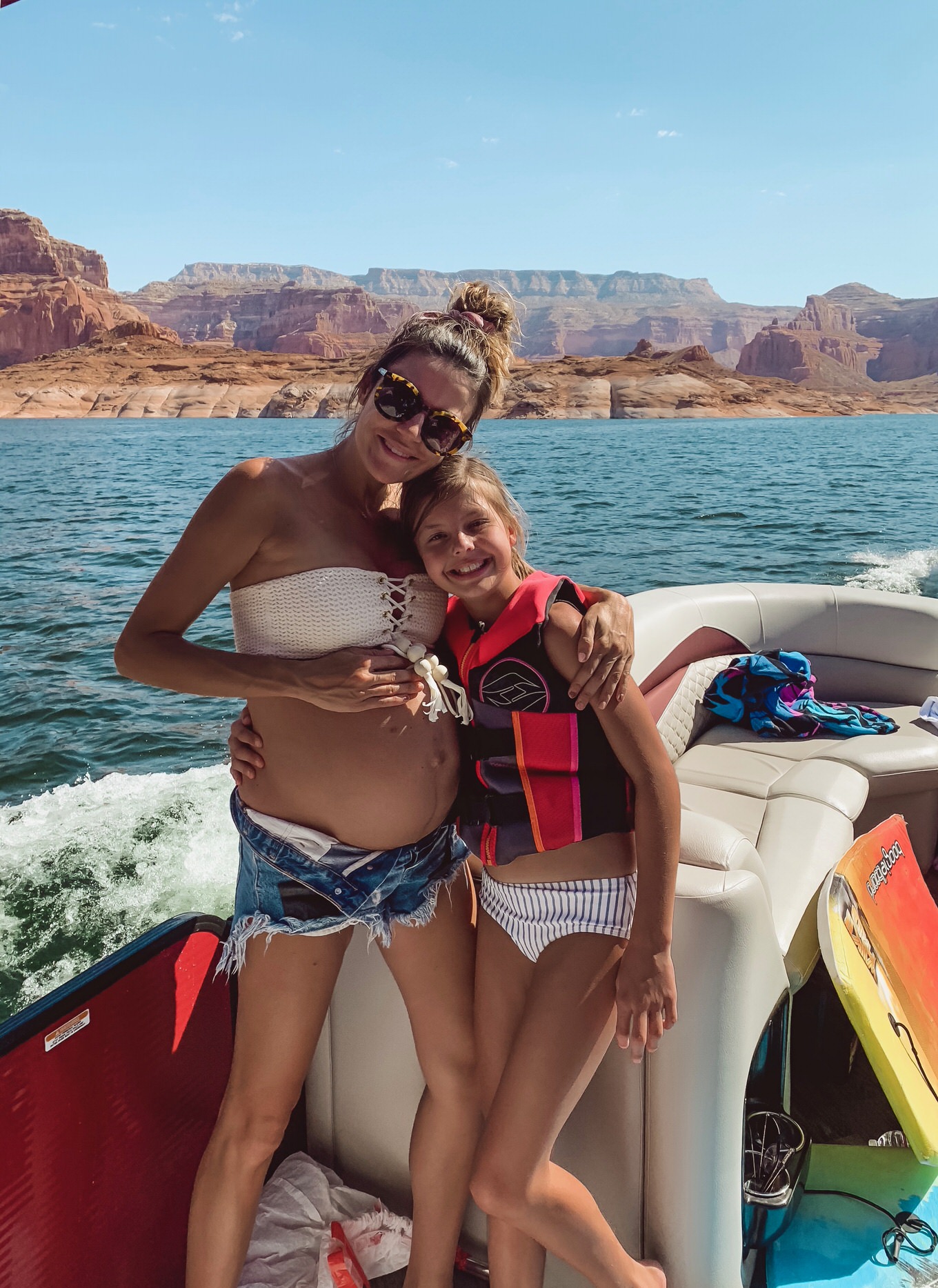 christine and mara on boat in lake powell