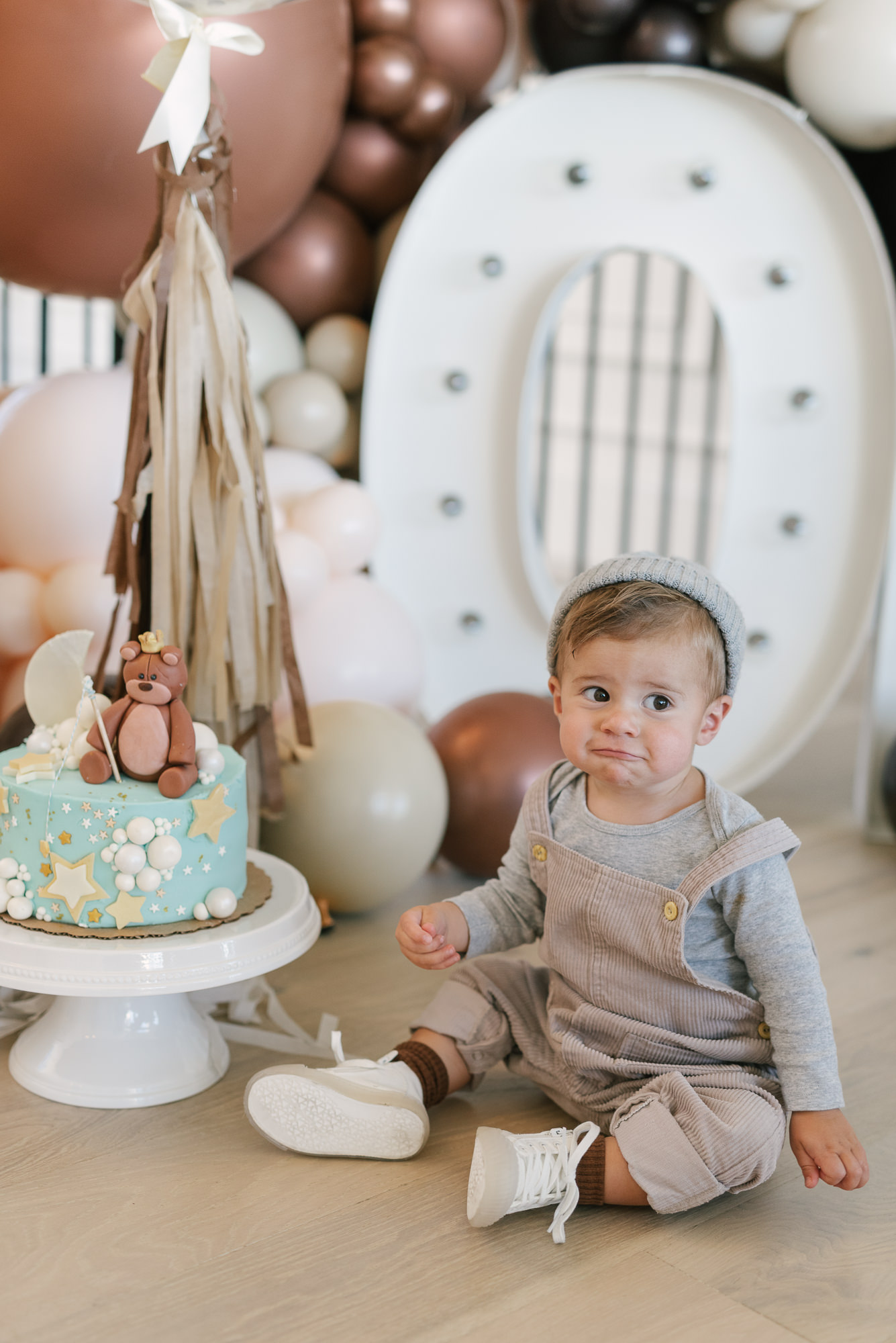 baby and birthday cake