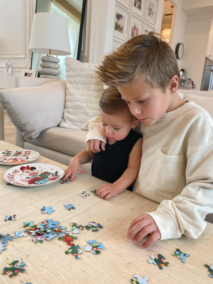 brothers doing puzzles