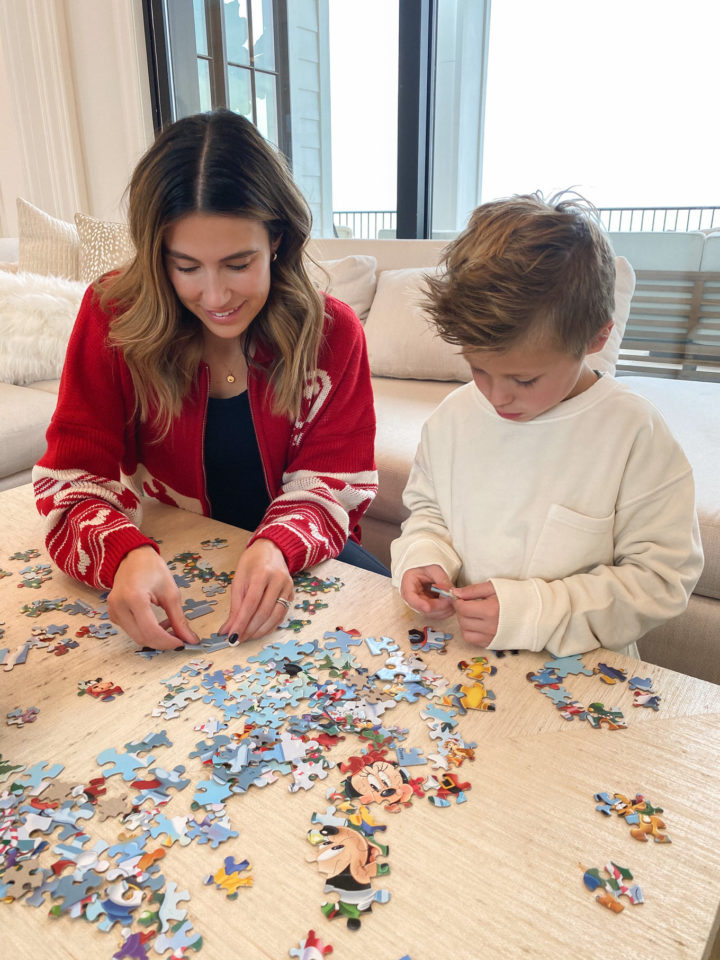 mom and son doing puzzle