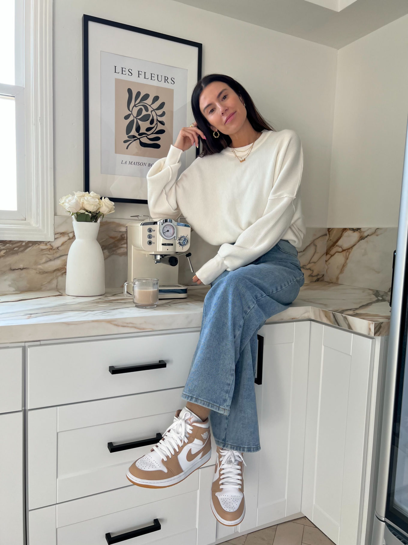 amazon home, espresso machine, les fleurs print, glass coffee mugs, white sweater, denim jeans, tan nikes, gold jewelry