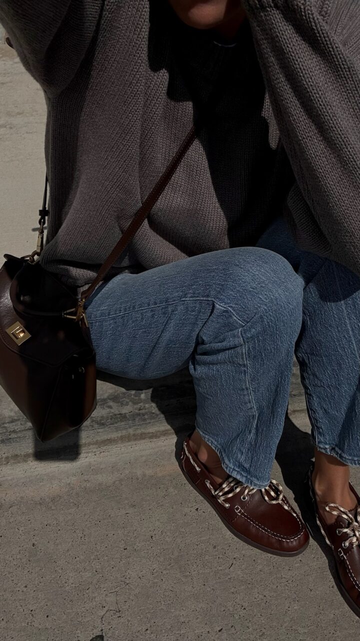 Christine Andrew in Madewell jeans and Gap sweater with boat shoes for fall